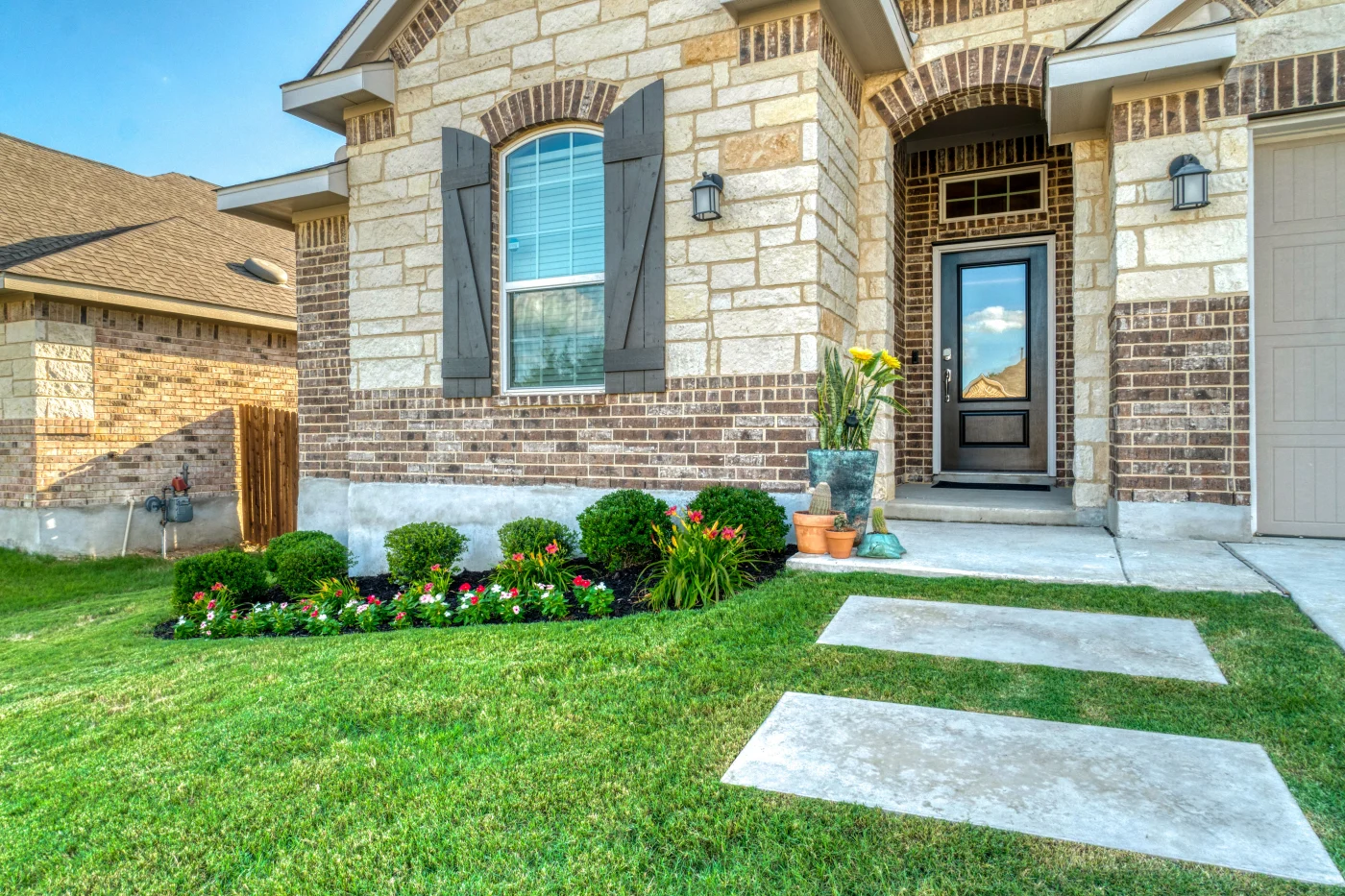 Superior Residential Door Replacement Ortega Fl Jacksonville Doors And Windows Black entry door with glass on stone and brick house