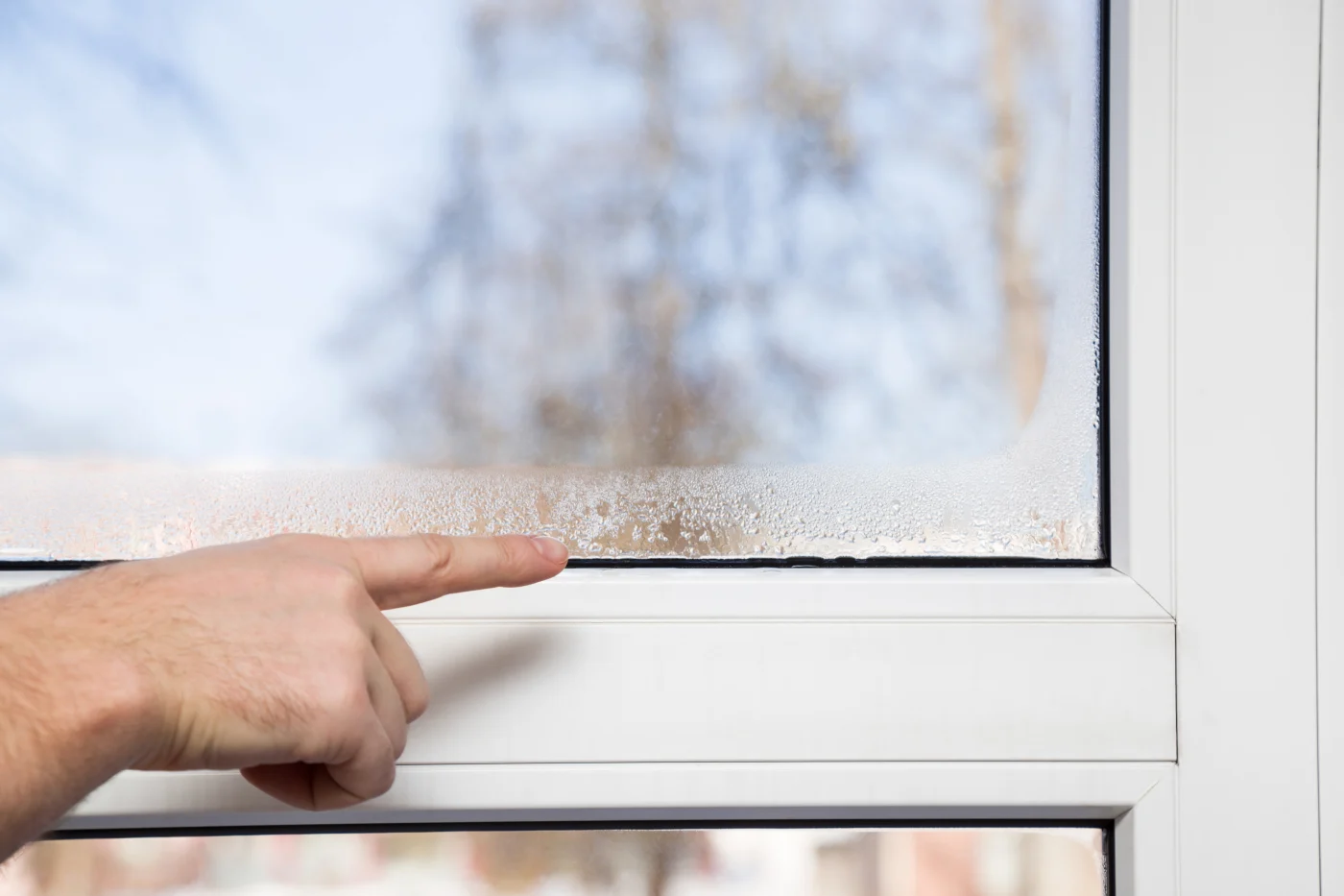 Window Replacement For Condensation Jacksonville Beach By Jacksonville Doors And Windows Closeup of pointing to window condensation