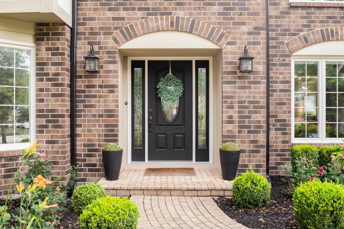Wooden door in brick house