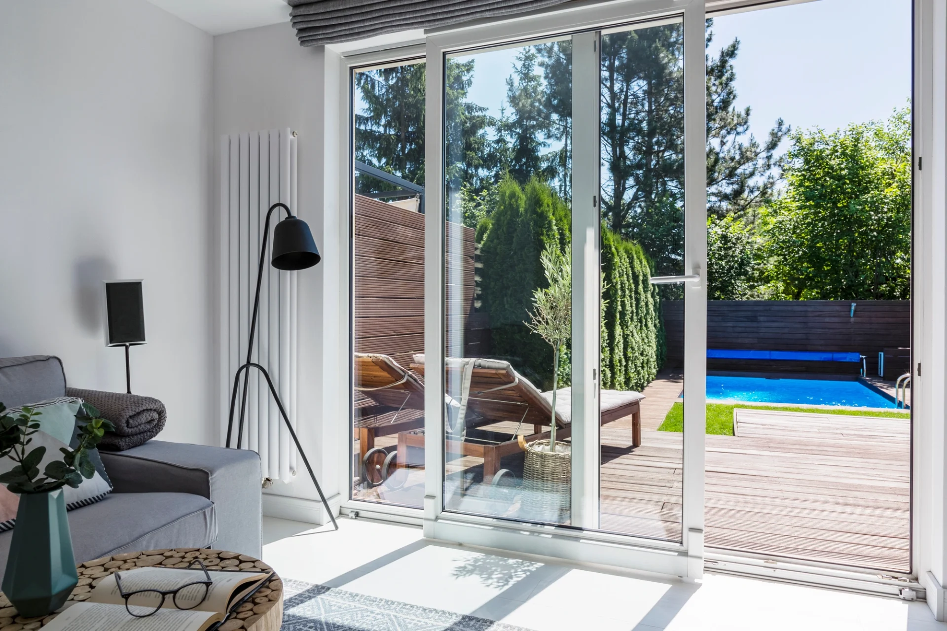 Sliding glass patio door leading out to the pool