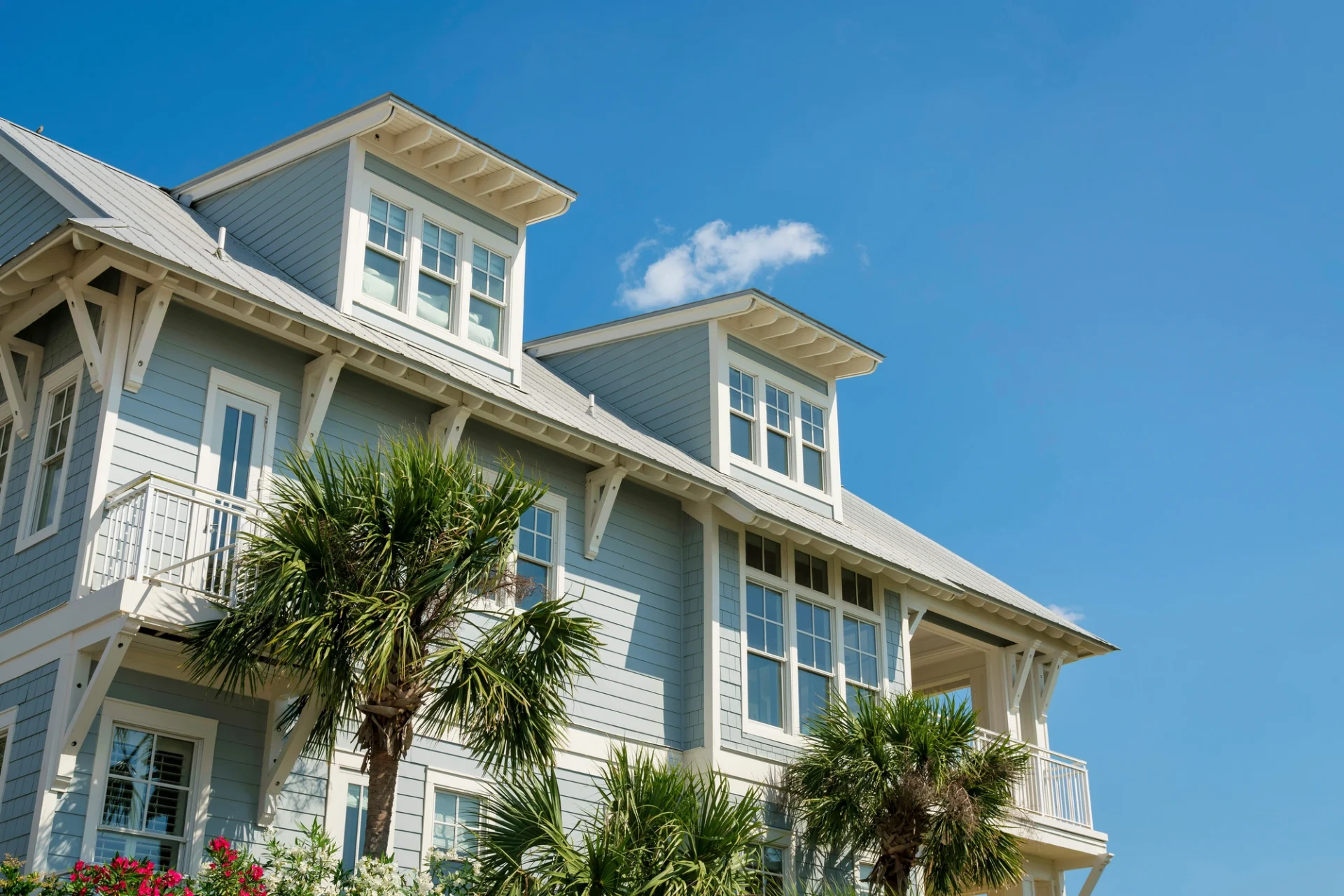 Home Defining Replacement Windows Riverside Fl Jacksonville Doors And Windows A gorgeous Florida home with blue siding and tall, eye-catching replacement windows