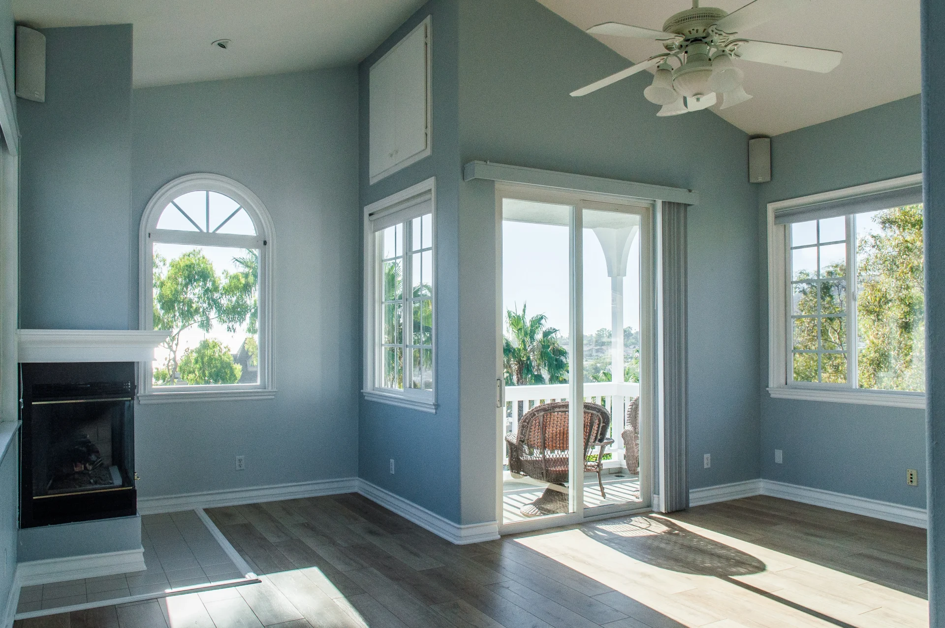 Refreshing Replacement Windows In Mandarin, FL | Jacksonville Doors & Windows A guest bedroom with baby-blue walls has new replacement windows and has been emptied for spring cleaning.