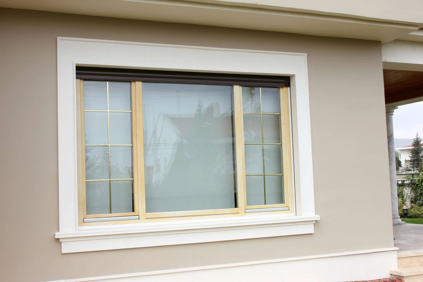 Angled view from the front corner highlights the symmetry of the home's new windows.