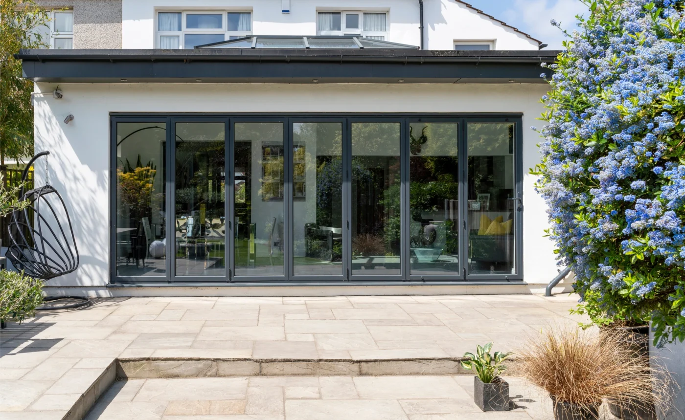 Wide bifold doors with black frames