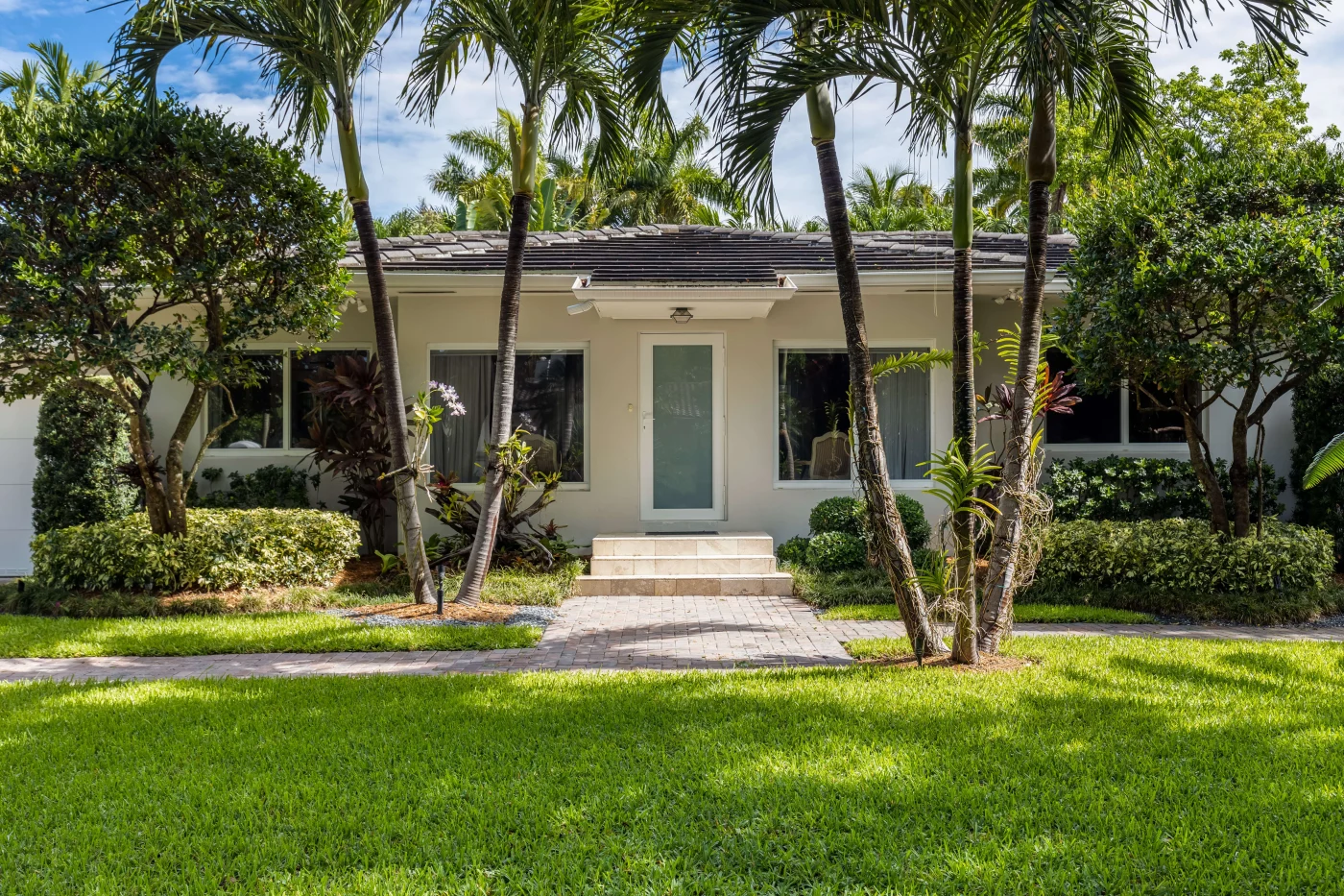 Beautiful white windows on home with entry door that matches