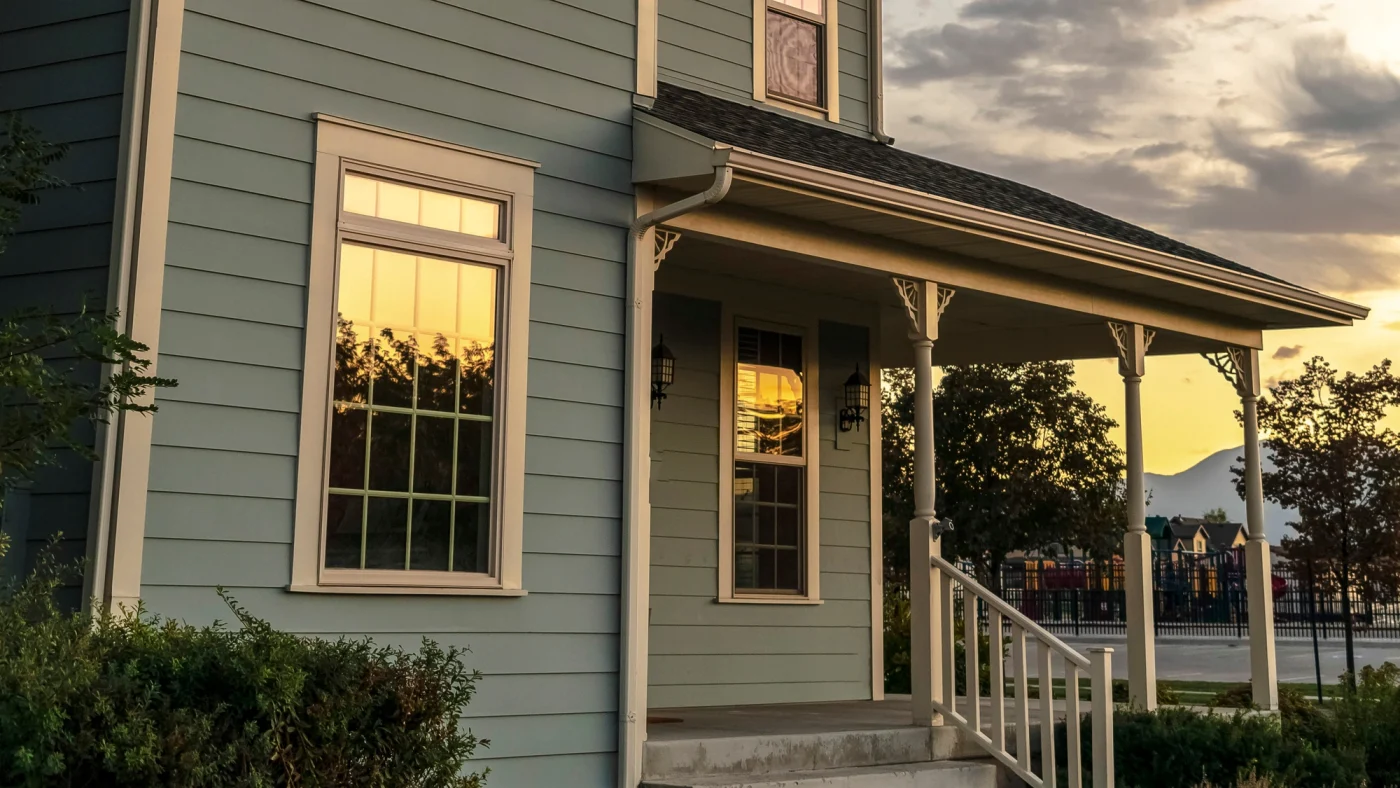Large windows on dark blue house
