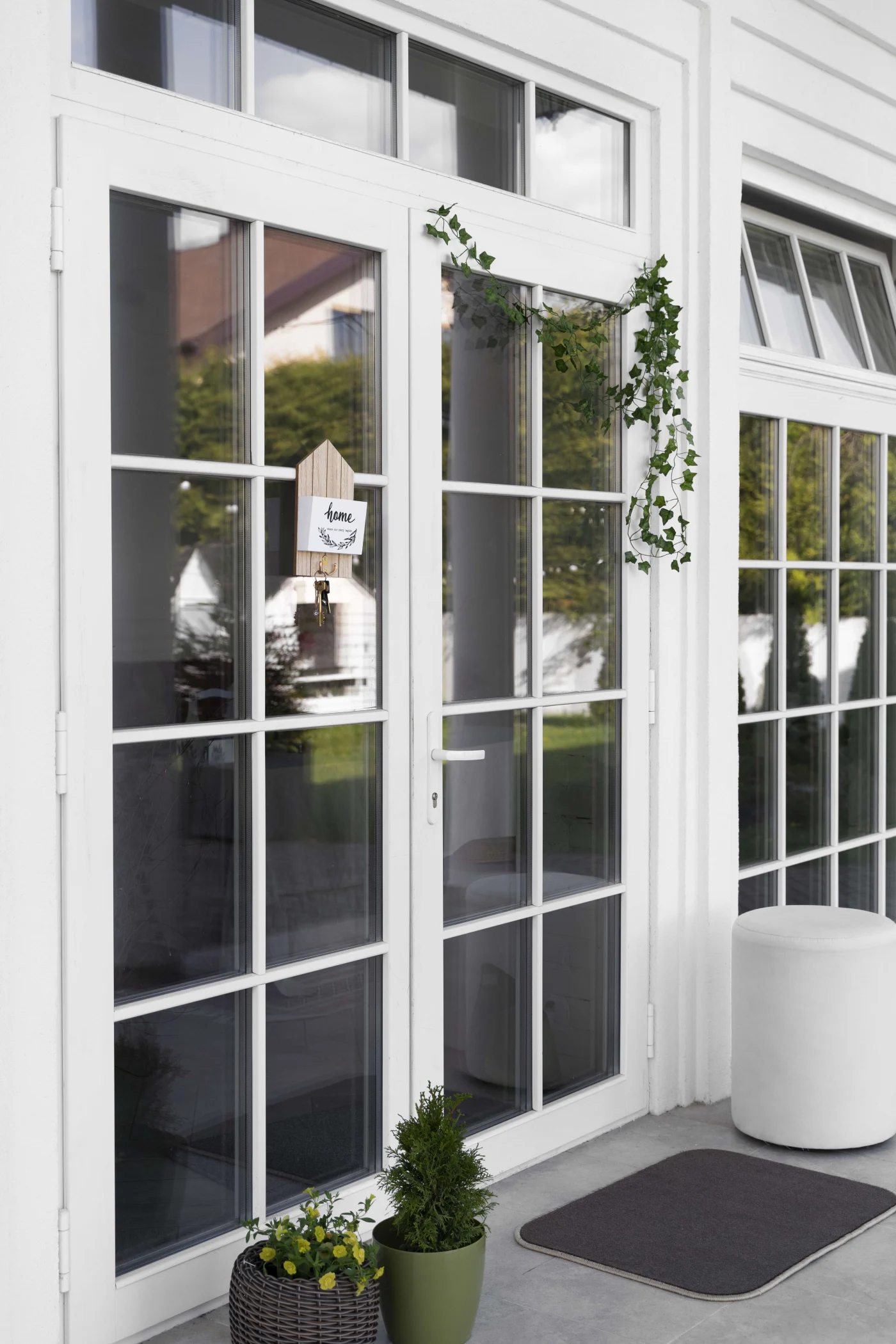 A white, window-pane style patio door in Northern Florida