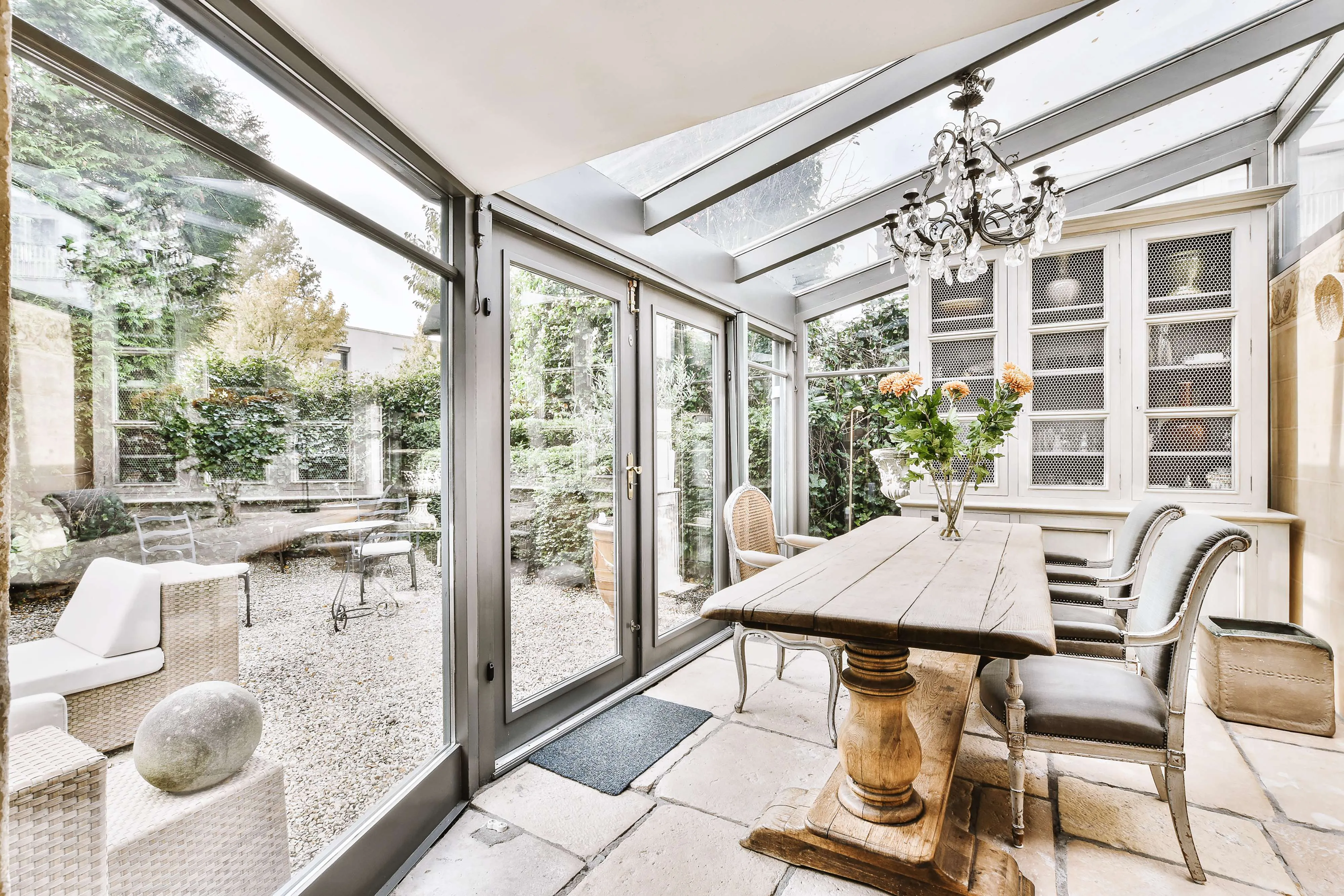 A sunroom with glass patio doors in the Jacksonville Beach area.