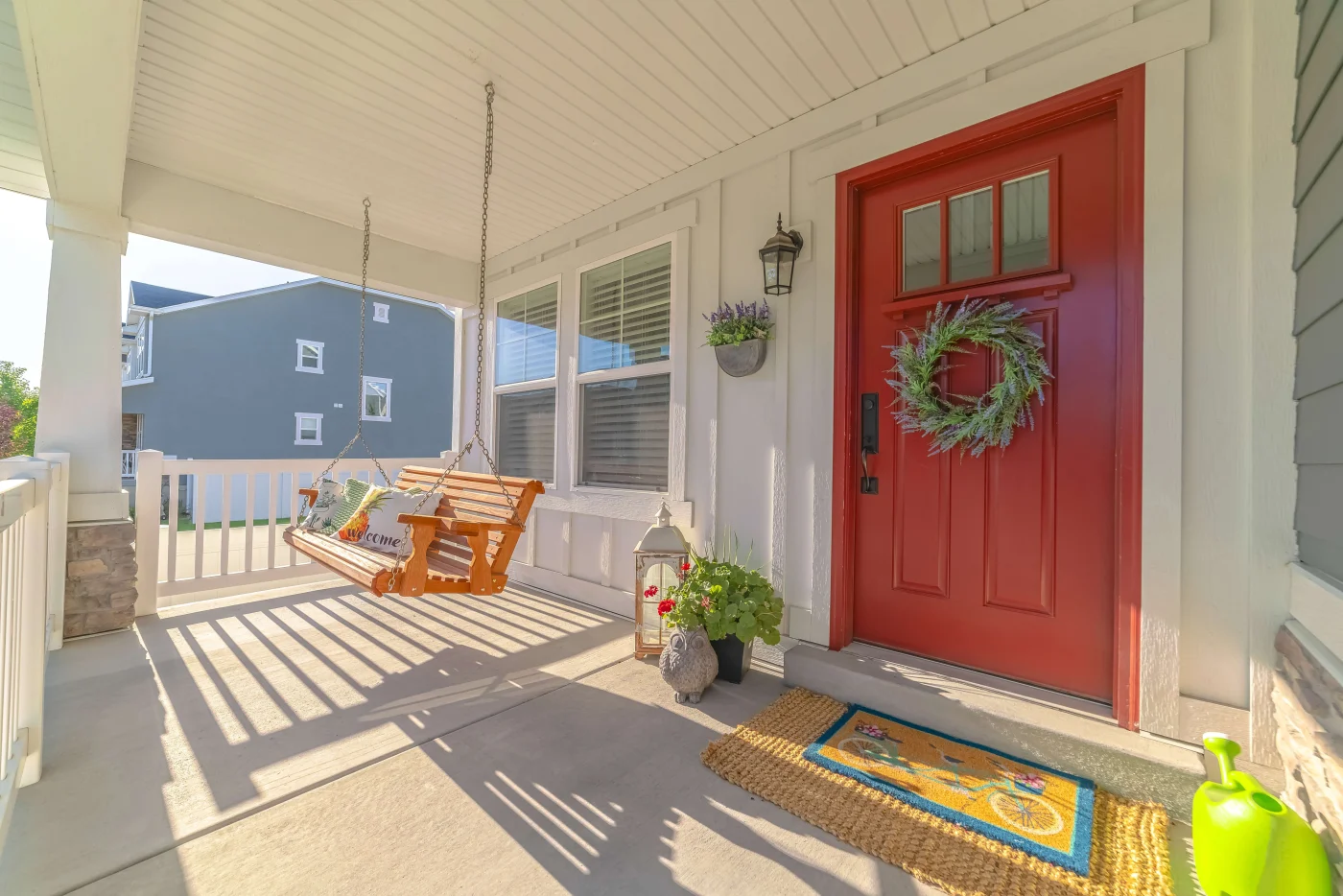 Gorgeous Front Replacement Doors In San Jose, FL | Jacksonville Doors & Windows A red front door on a suburban home in Florida.