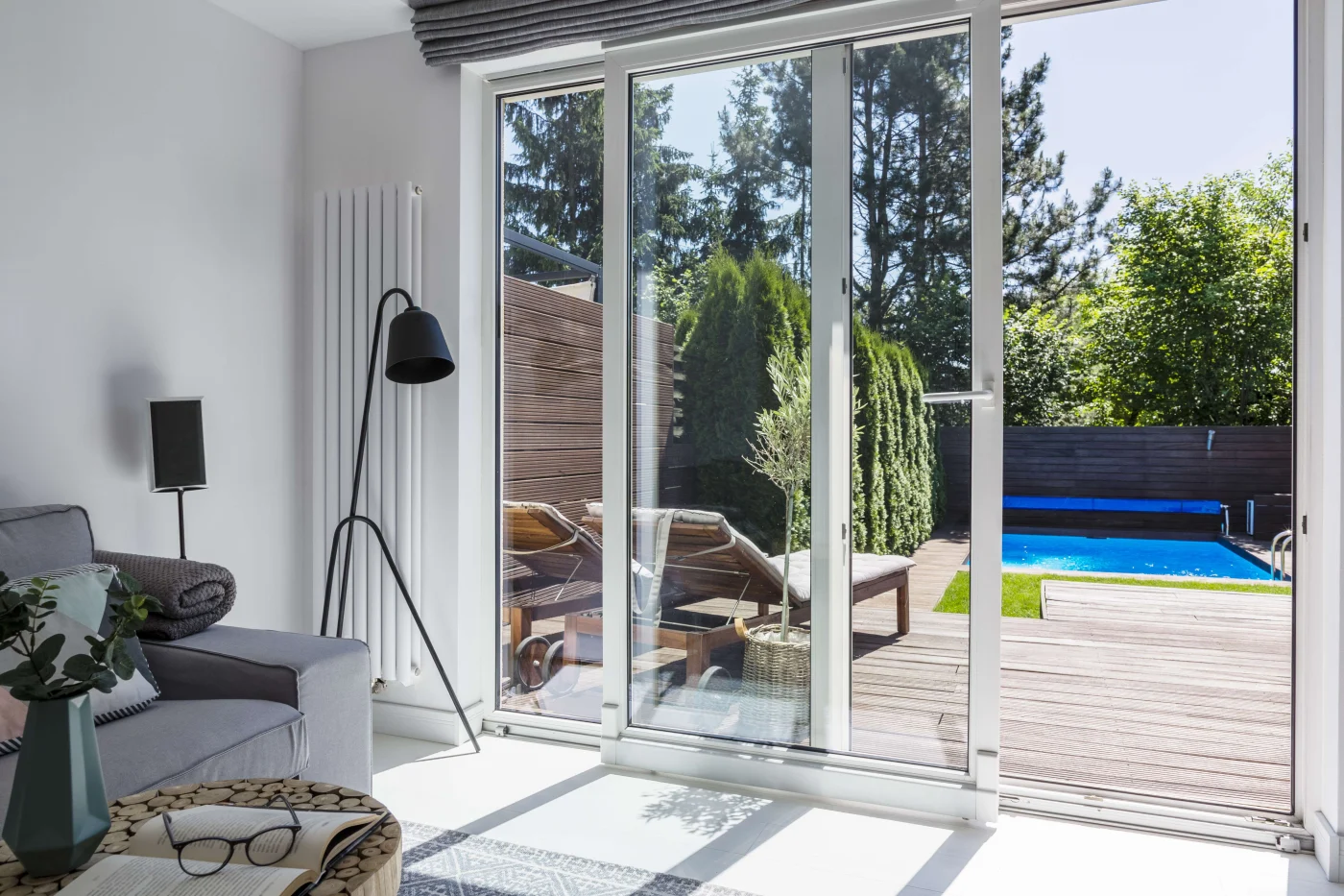 Expert French Doors In Vilano Beach FL | Jacksonville Doors & Windows Sliding patio doors with black frames in a Vilano Beach, FL home.