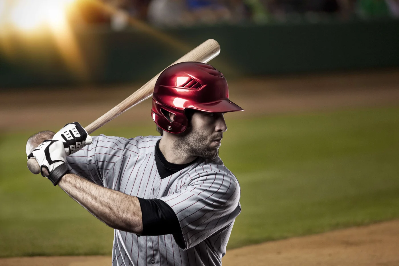 Strictly Professional Replacement Doors in the Jacksonville Area | Jacksonville Doors & Windows A professional baseball player with a red helmet up to bat in a stadium.