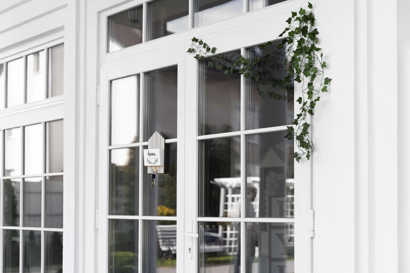 Beautiful Patio Door Replacements in Orange Park, FL | Jacksonville Doors & Windows French patio doors with colonial grids on a home patio.