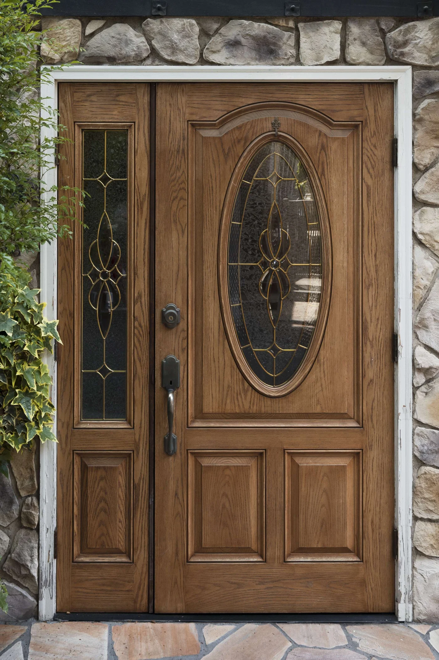 Gorgeous Entry Doors in Orange Park, FL | Jacksonville Doors & Windows A beautiful new fiberglass door with a glass insert, designed to look like wood.